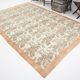 Tapis en laine et coton à décor floral