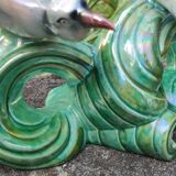 Old barbotine statue seagulls on the wave