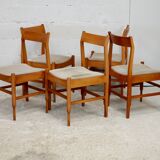 5 chaises en bois piètement fuselé circa 1975