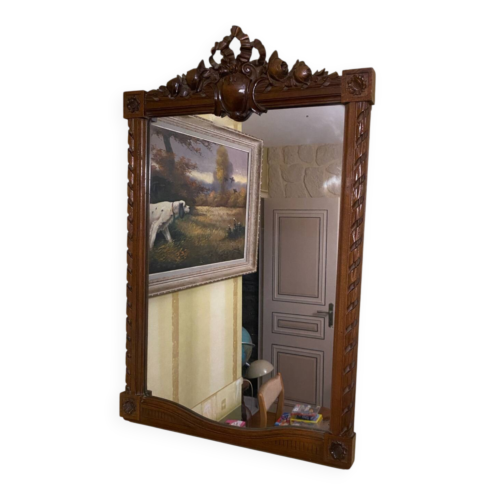 Carved wooden mirror in Louis XVI style