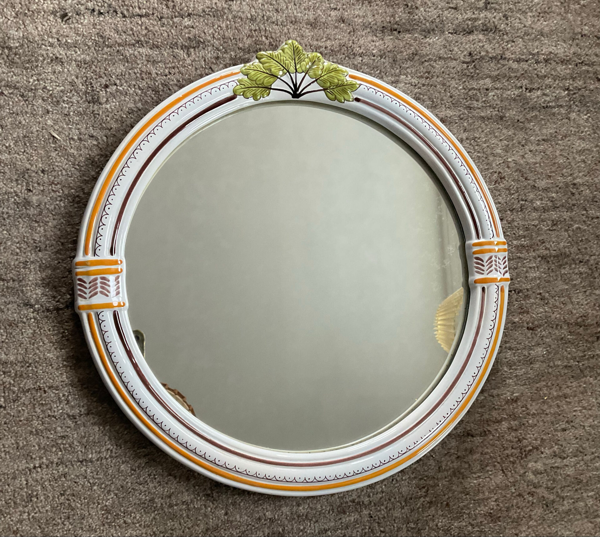 Vintage round ceramic mirror