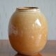 Small varnished sandstone vase