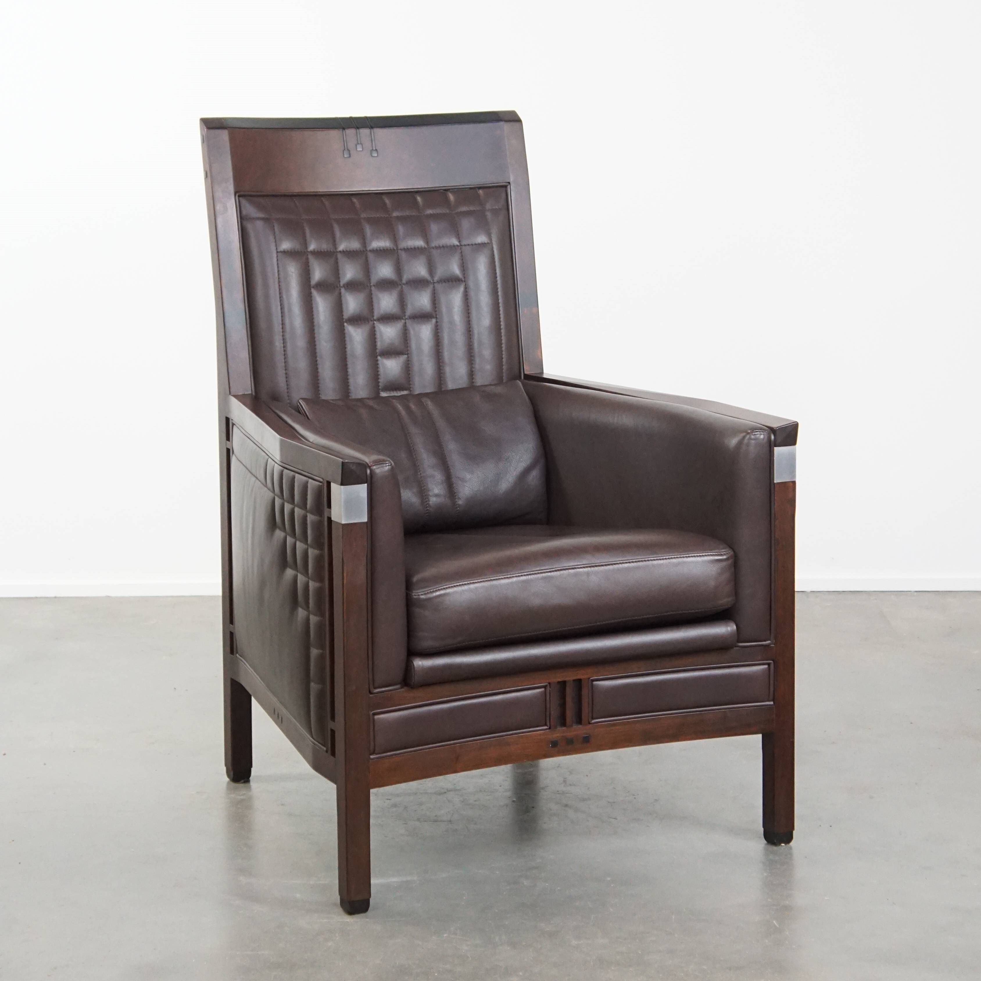 Art Deco armchair with dark brown leather