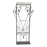 Wrought iron coat rack and shelf
