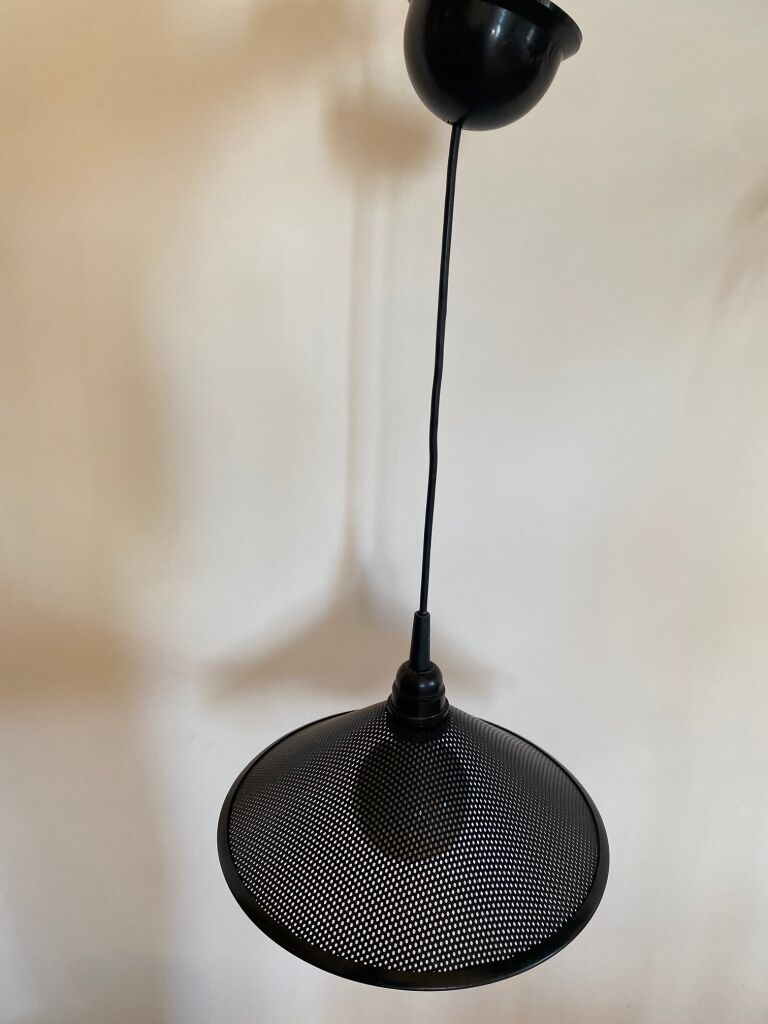 Black perforated metal suspension