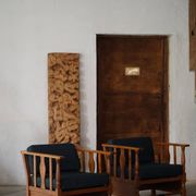 Art Nouveau, pair of oak lounge chairs, reupholstered in style fabric, 1920s.