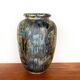 Large Art Deco vase, in glazed and iridescent blue stoneware, by Roger Guérin 1930.