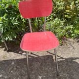 Formica table with a red Mid-century chair.