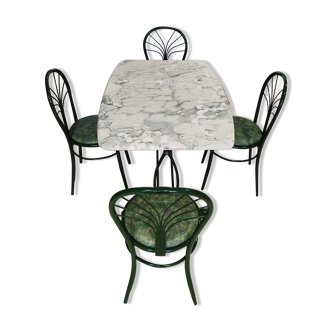 Marble dining table, green cast iron legs and 4 matching steel tube chairs imitation leather upholstery