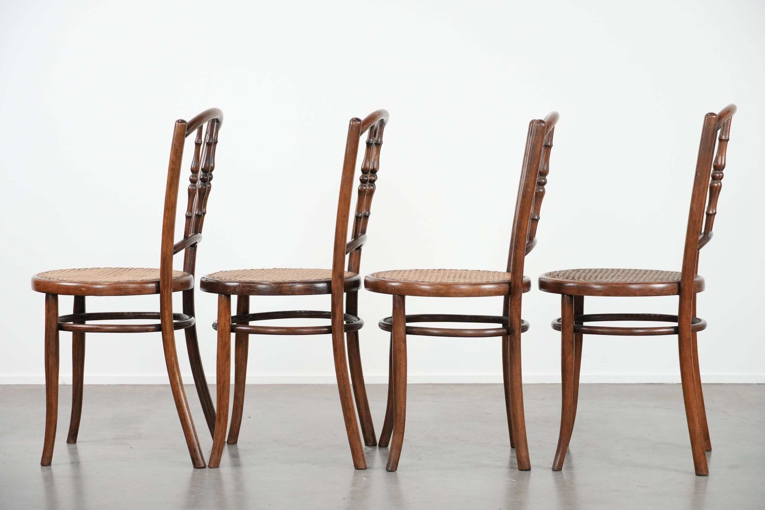 Set of 4 vintage bistro chairs Jacob & Josef Kohn Wien with a wicker seat