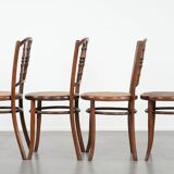 Set of 4 vintage bistro chairs Jacob & Josef Kohn Wien with a wicker seat