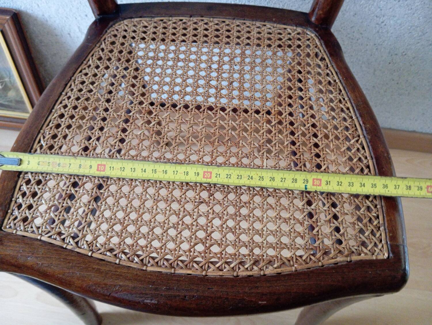 Wooden chair with cane seat, country style, around 1920