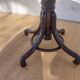 Swivel wooden armchair, pattern on seat