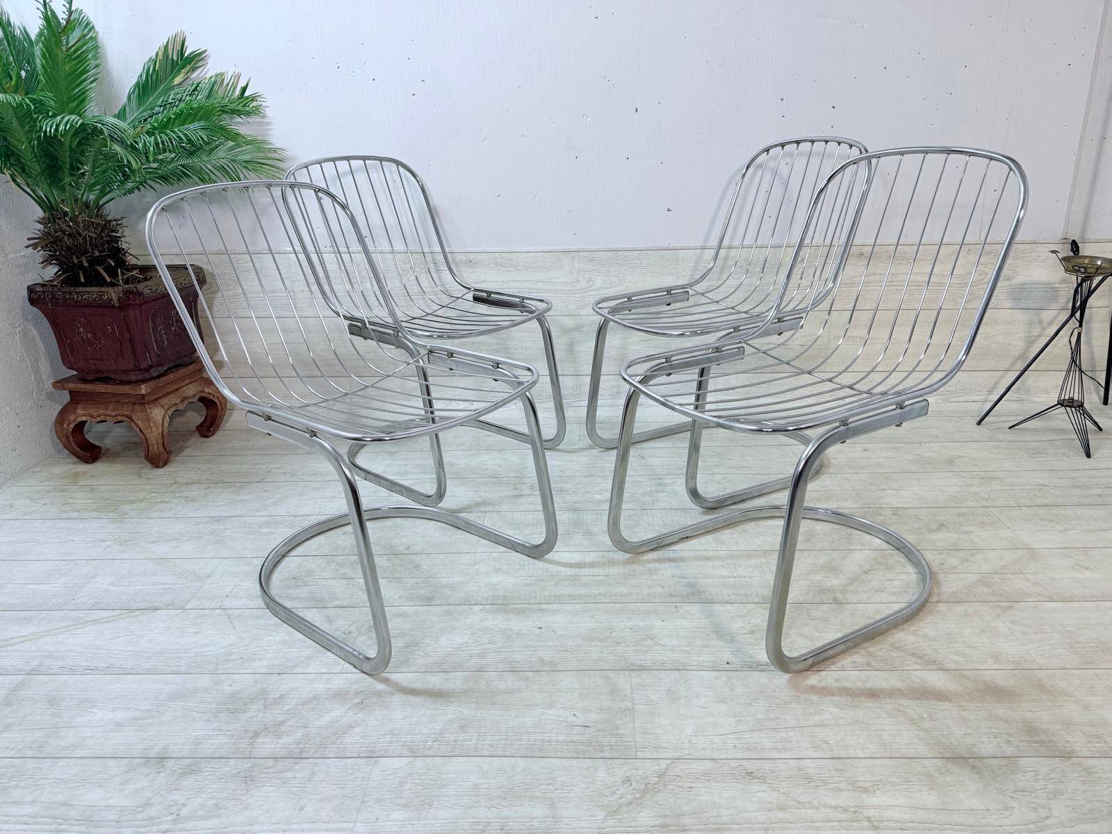 4 chrome chairs