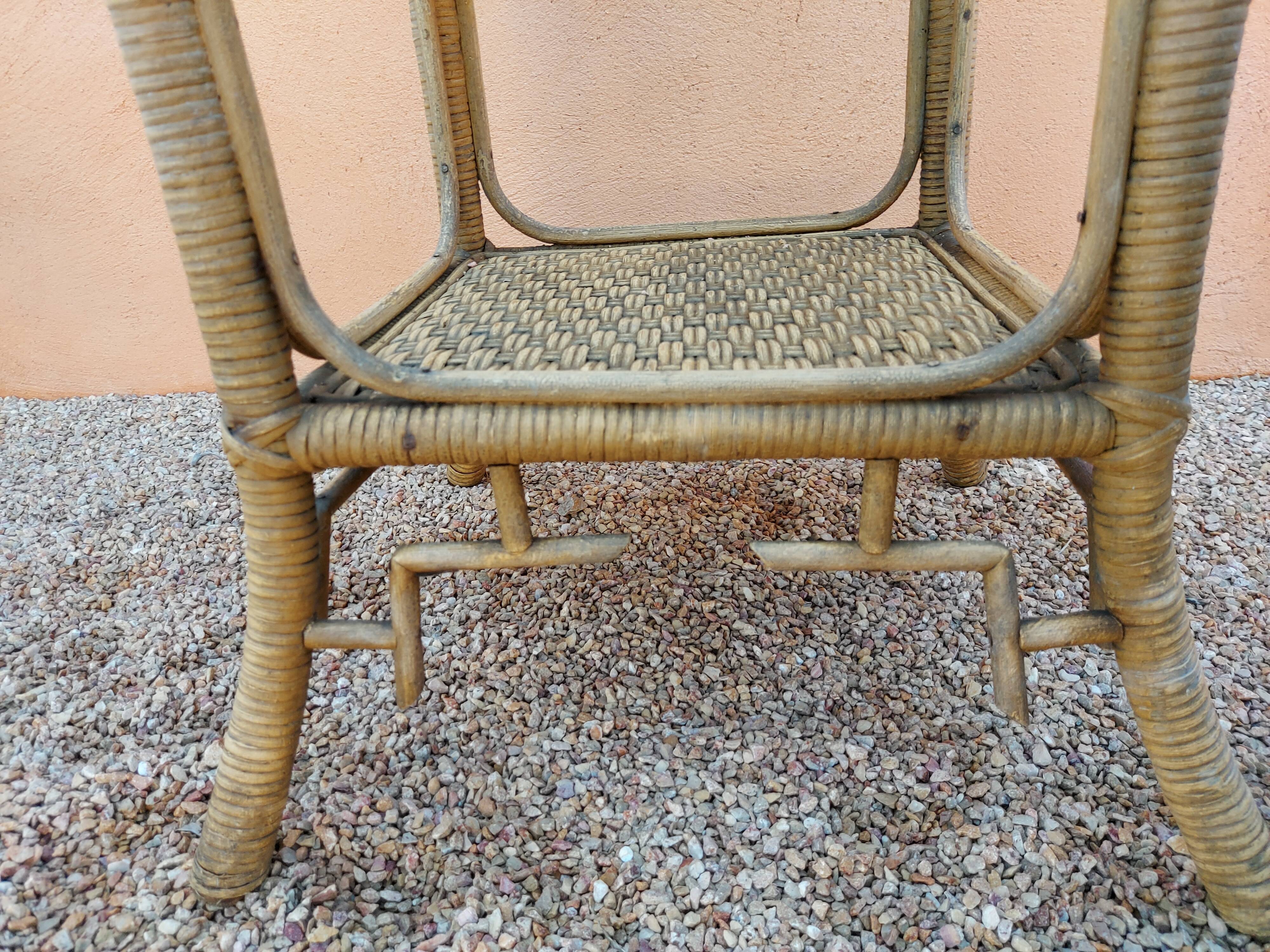 Pair of armchairs and rattan gueridon 1900s