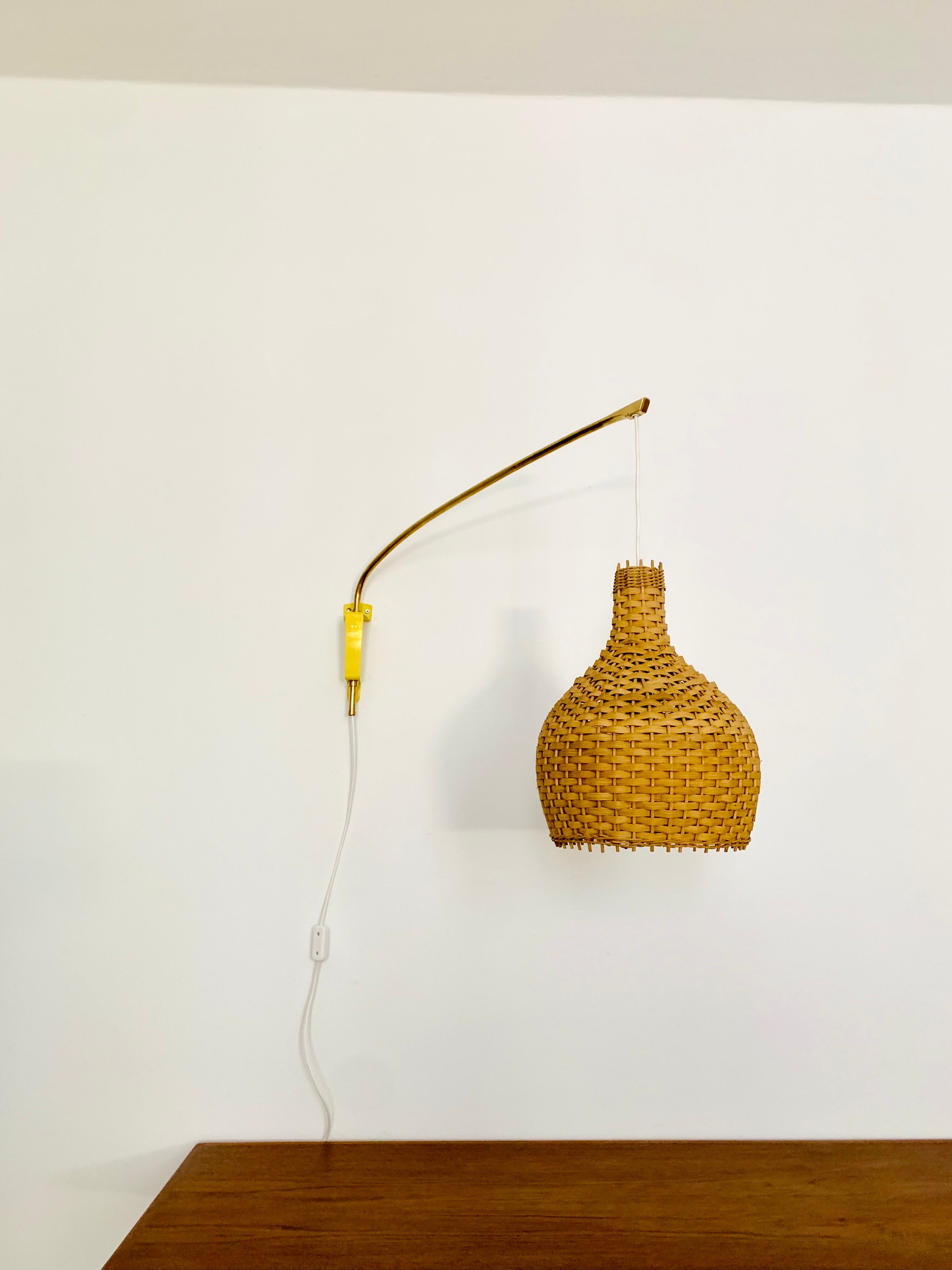 Adjustable Brass and Wicker Arc Sconce
