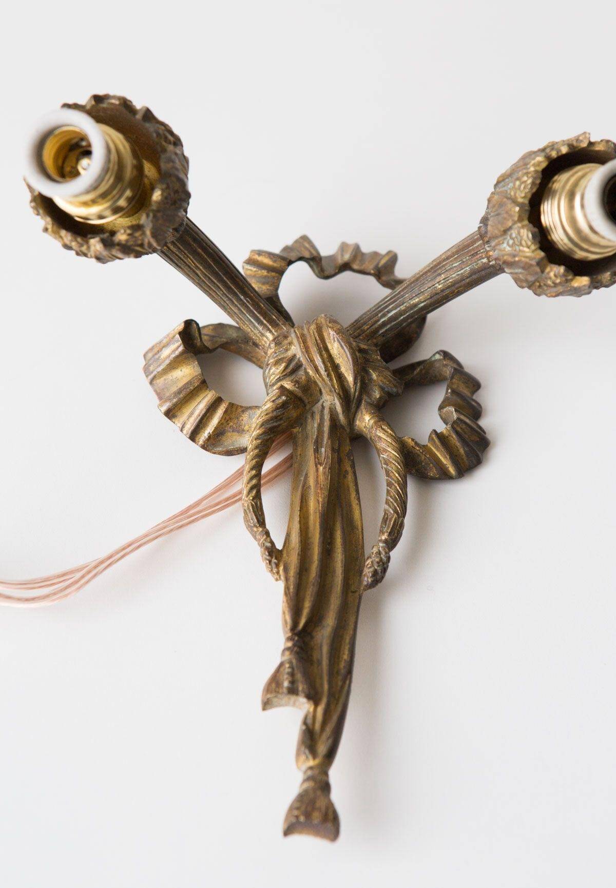 Pair of old French bronze wall lights from the beginning of the 20th century.