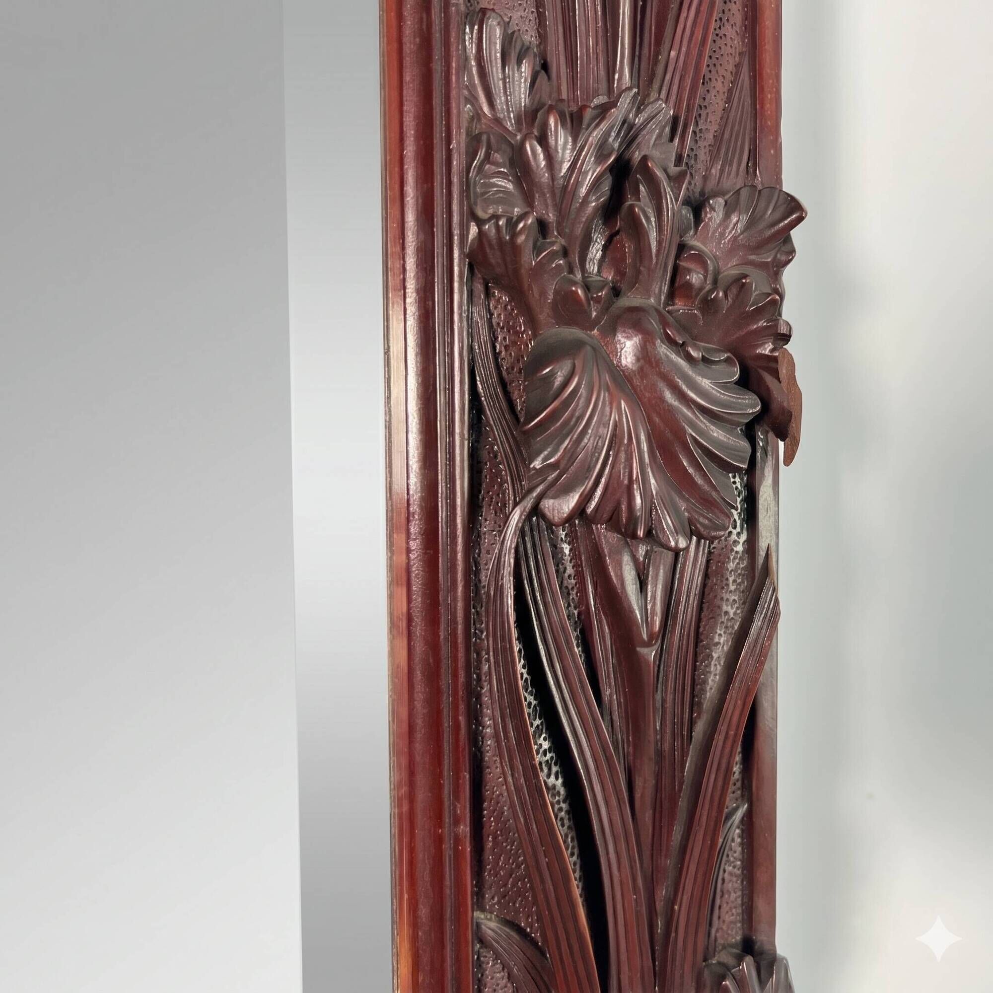Large mirror (2 metres) Art Nouveau in carved mahogany with high-relief decoration.