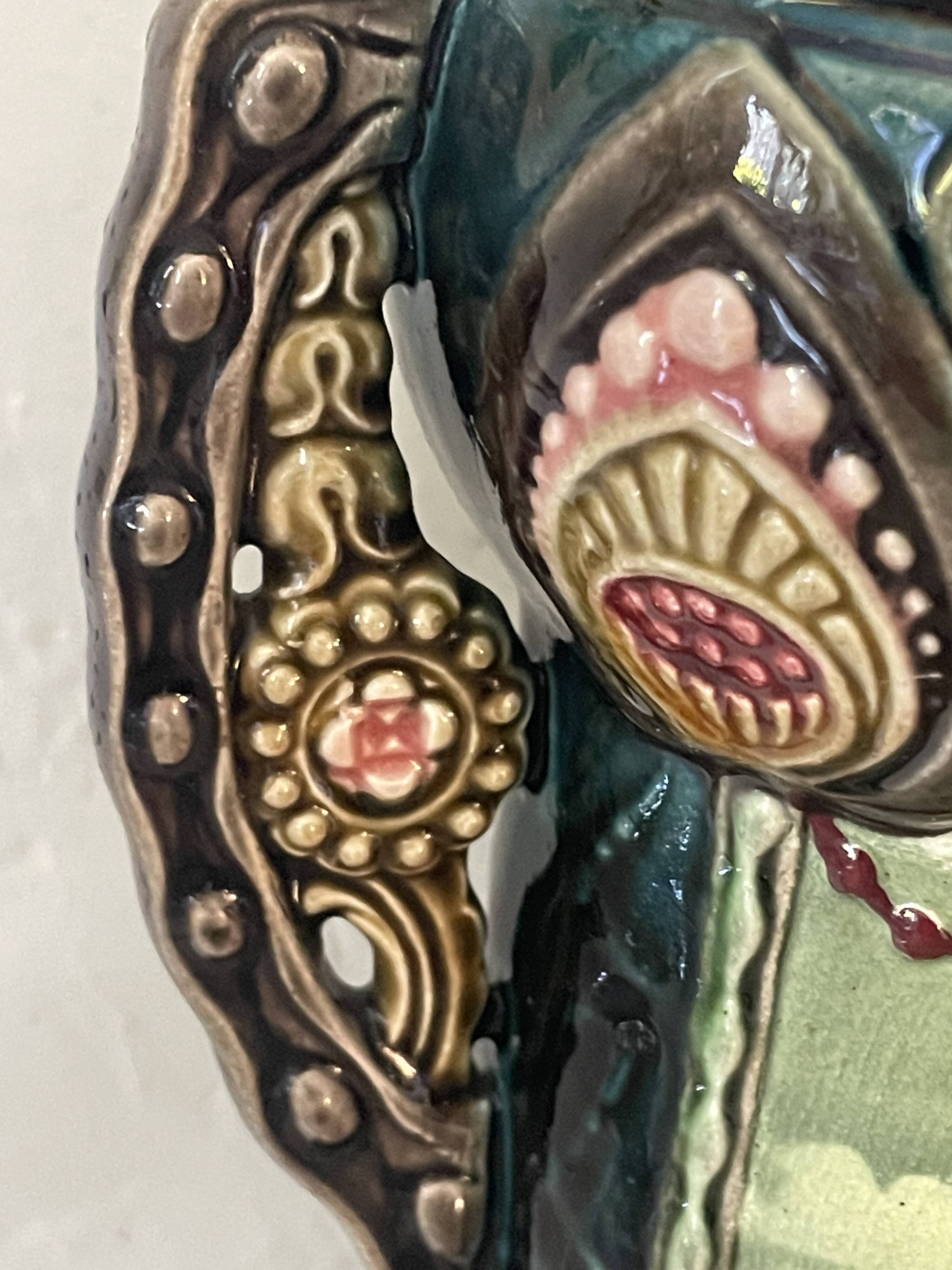 Pair of Art Nouveau slipware vases, hand-painted decoration.