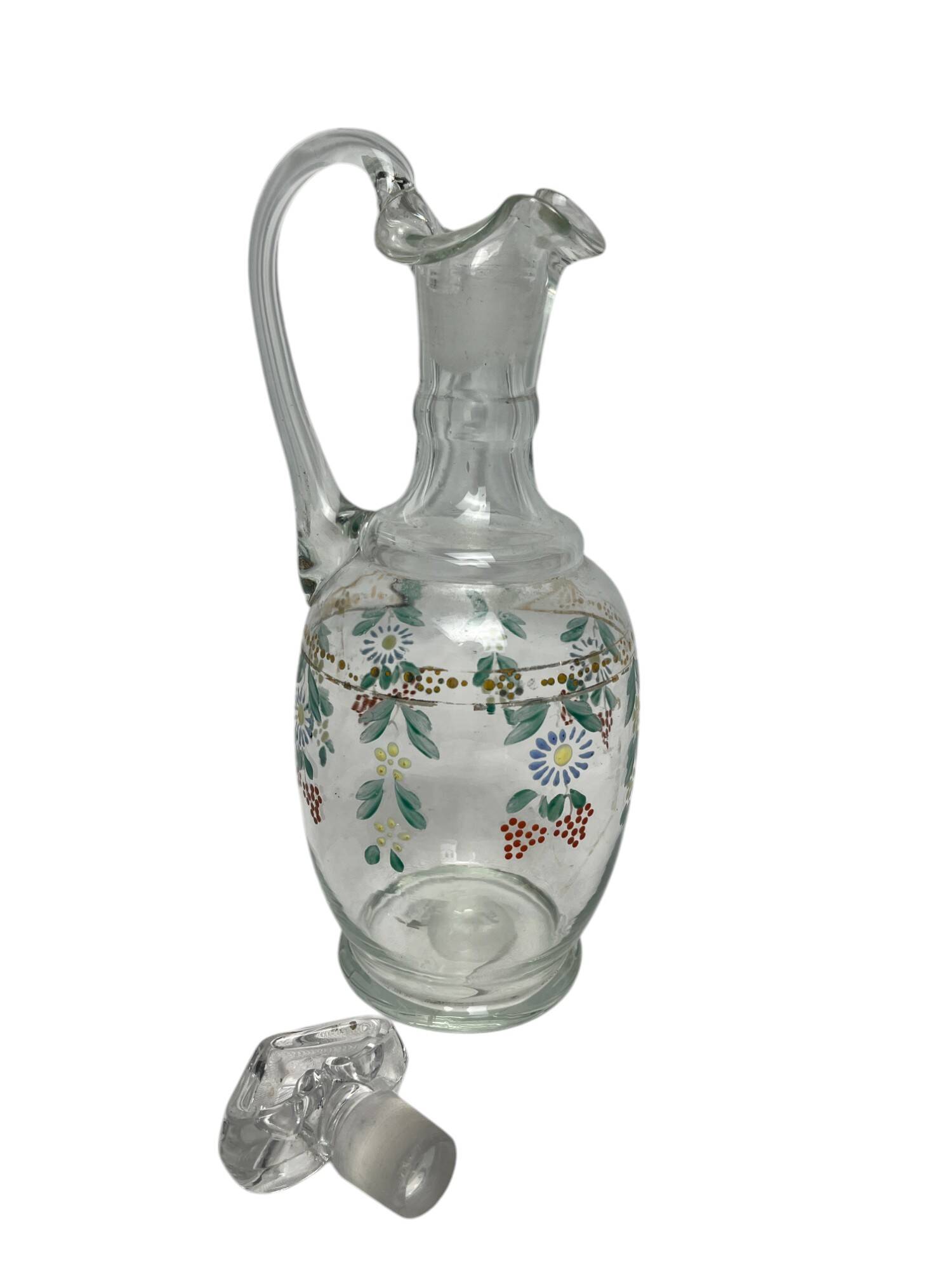Enameled glass carafe with flower decoration circa 1900