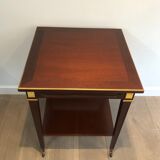 Two-level table in mahogany and brass