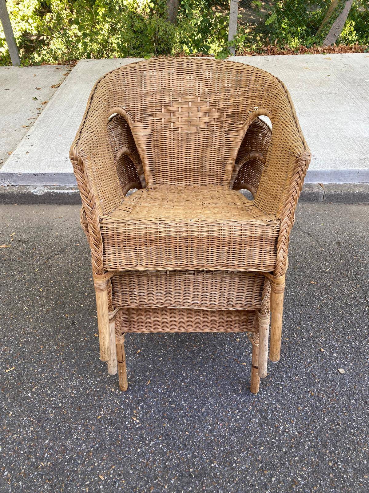 Rattan and woven wicker armchair in vintage bohemian style