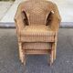 Rattan and woven wicker armchair in vintage bohemian style