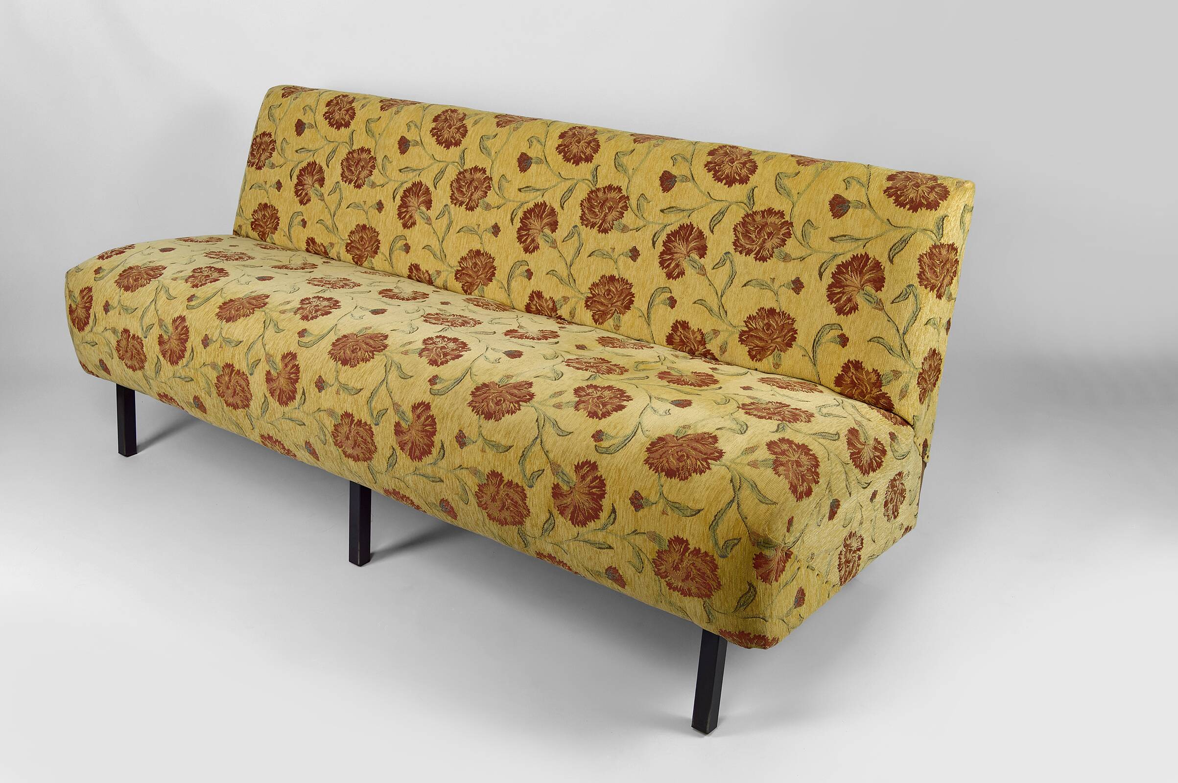 Bench with yellow and red floral fabric, France, circa 1960