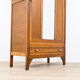 Art Deco wardrobe in carved wood with mirror from the 1930s.