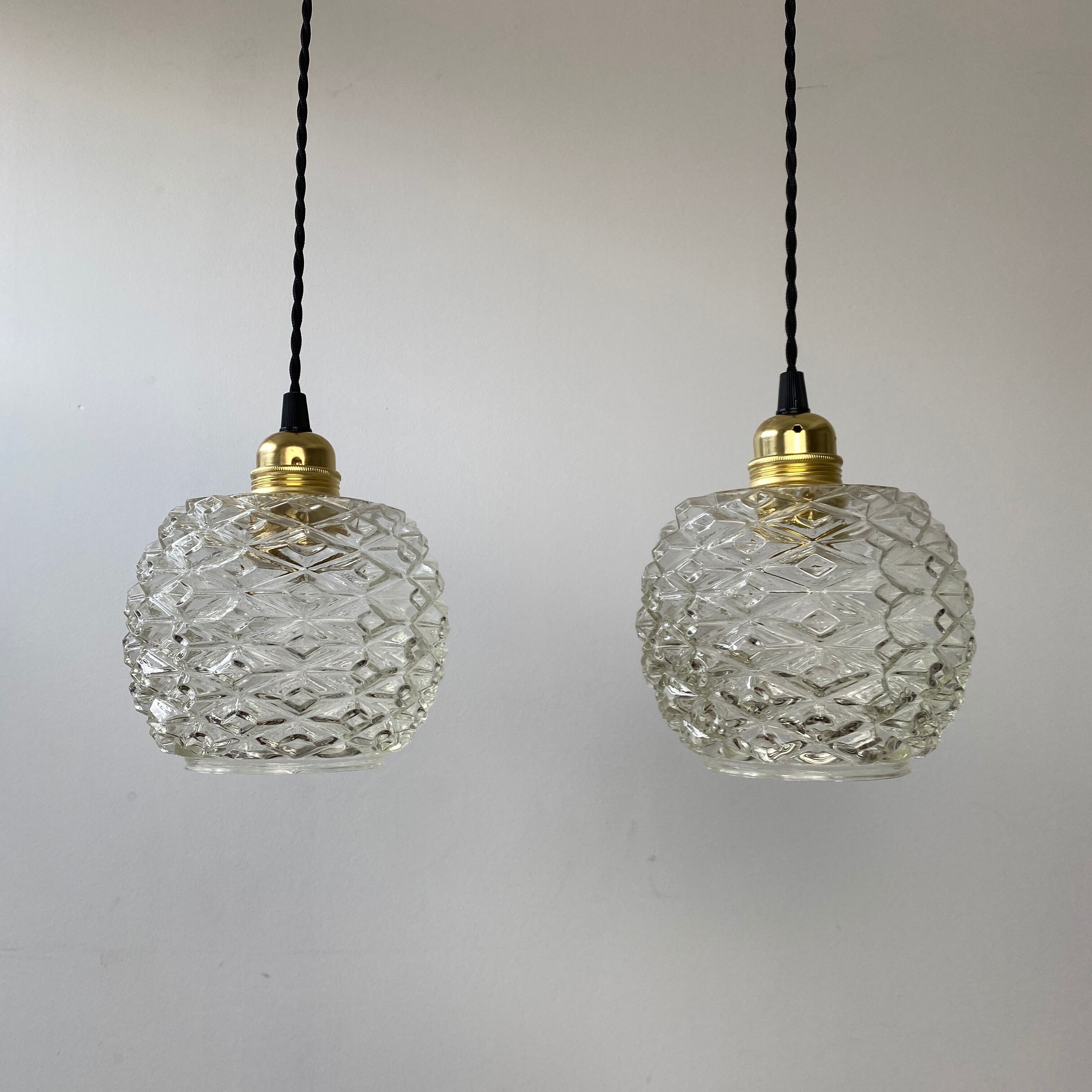 Pair of vintage molded glass pendant lamps