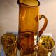 service 3 glasses and decanter color dark amber and gold 1970