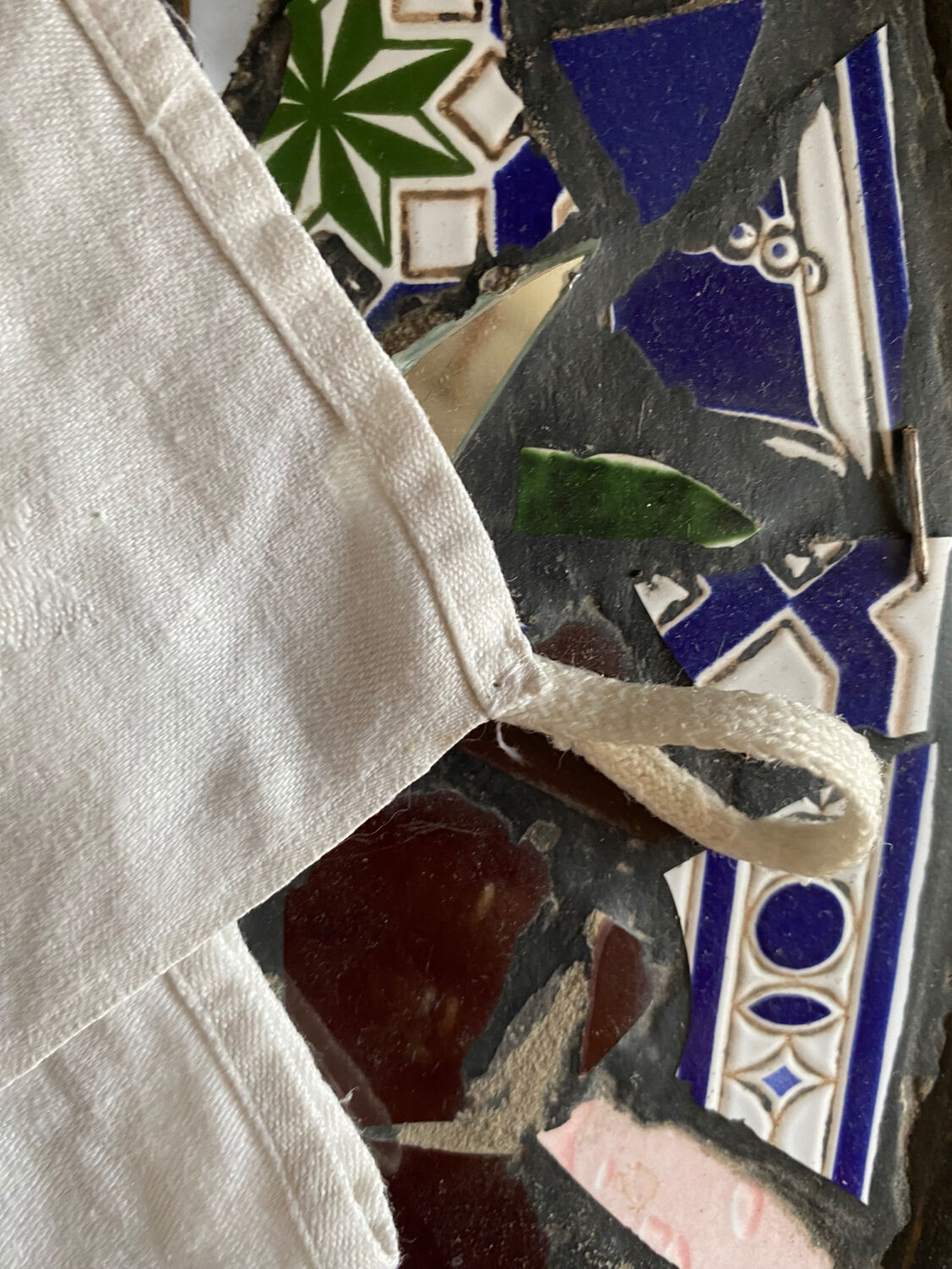 Large white cotton tea towel with damask thread.