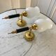 Pair of opaline and golden brass wall lamps art deco style 30s
