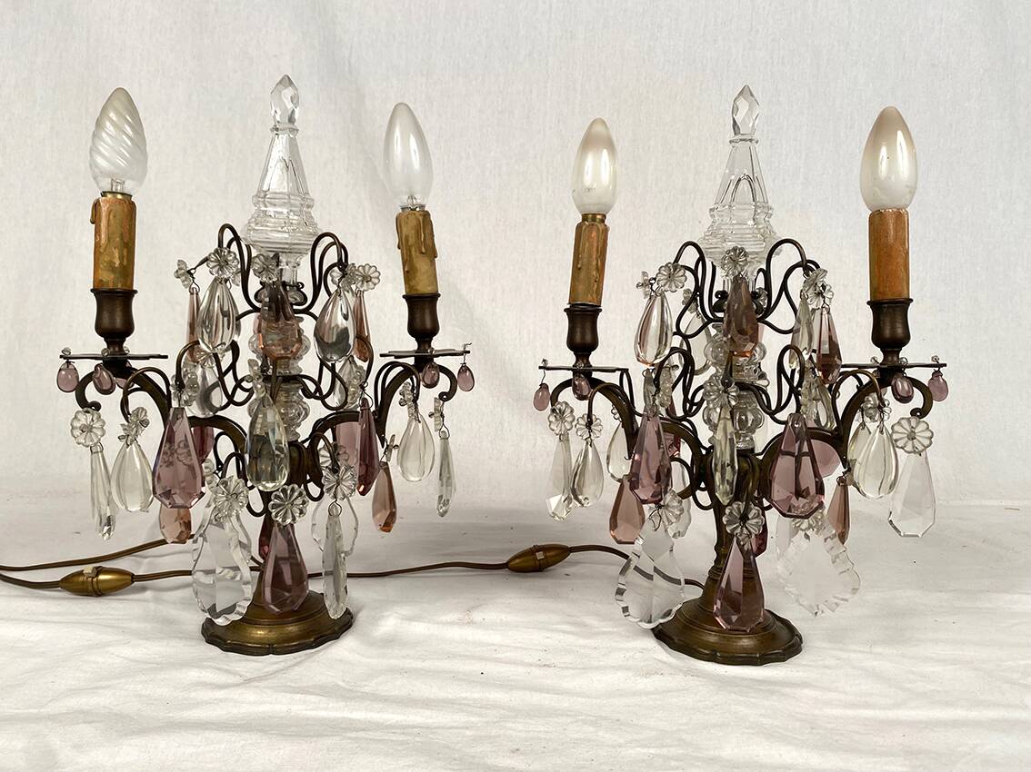 Pair of bronze chandeliers with tassels