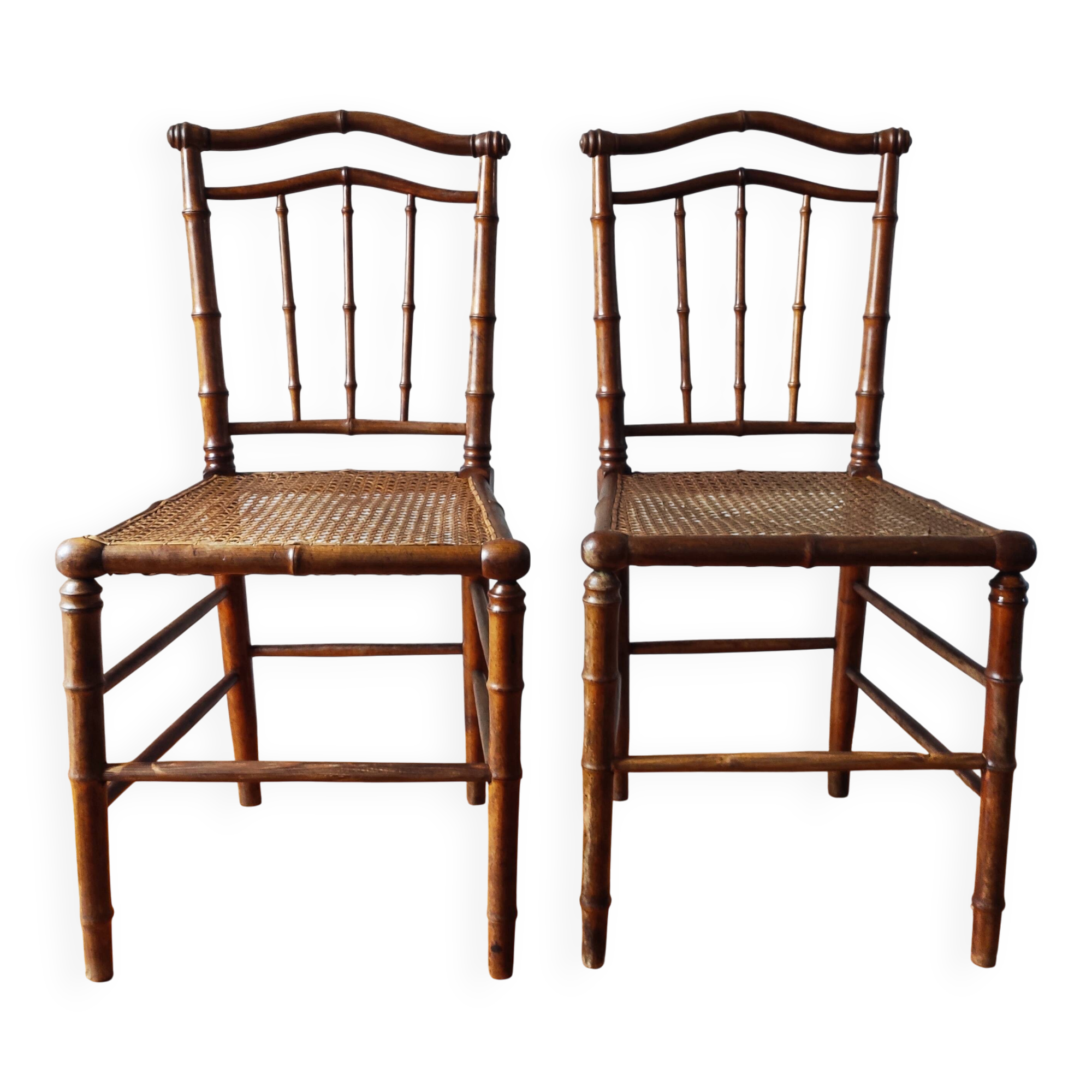 Pair of turned wood and cane chairs