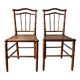 Pair of turned wood chairs with caning