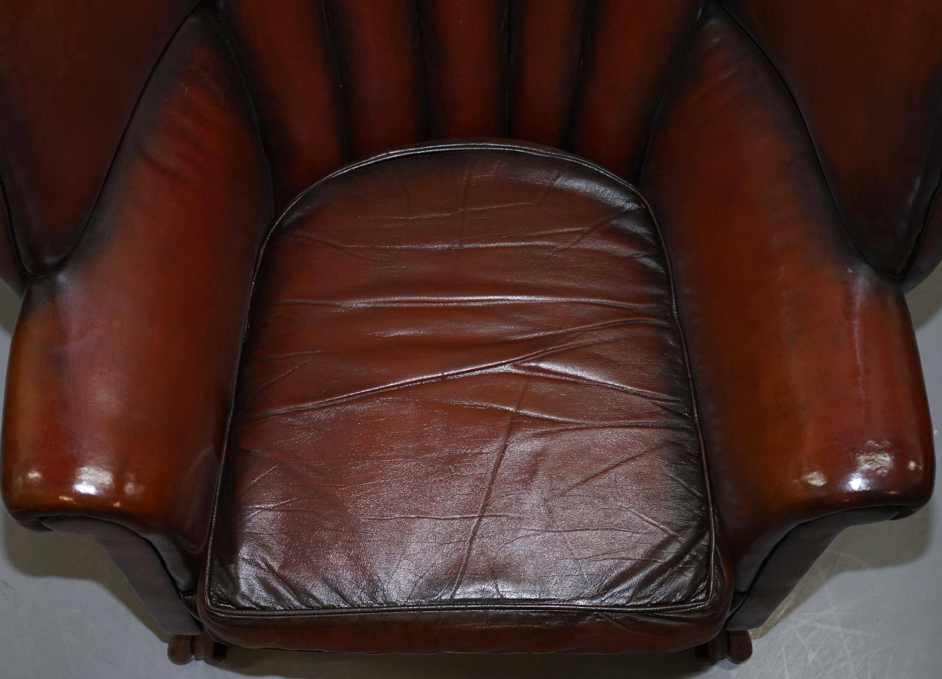 Victorian leather canapé and armchair, barrel back, circa 1860, restored.