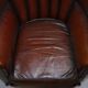 Victorian leather canapé and armchair, barrel back, circa 1860, restored.