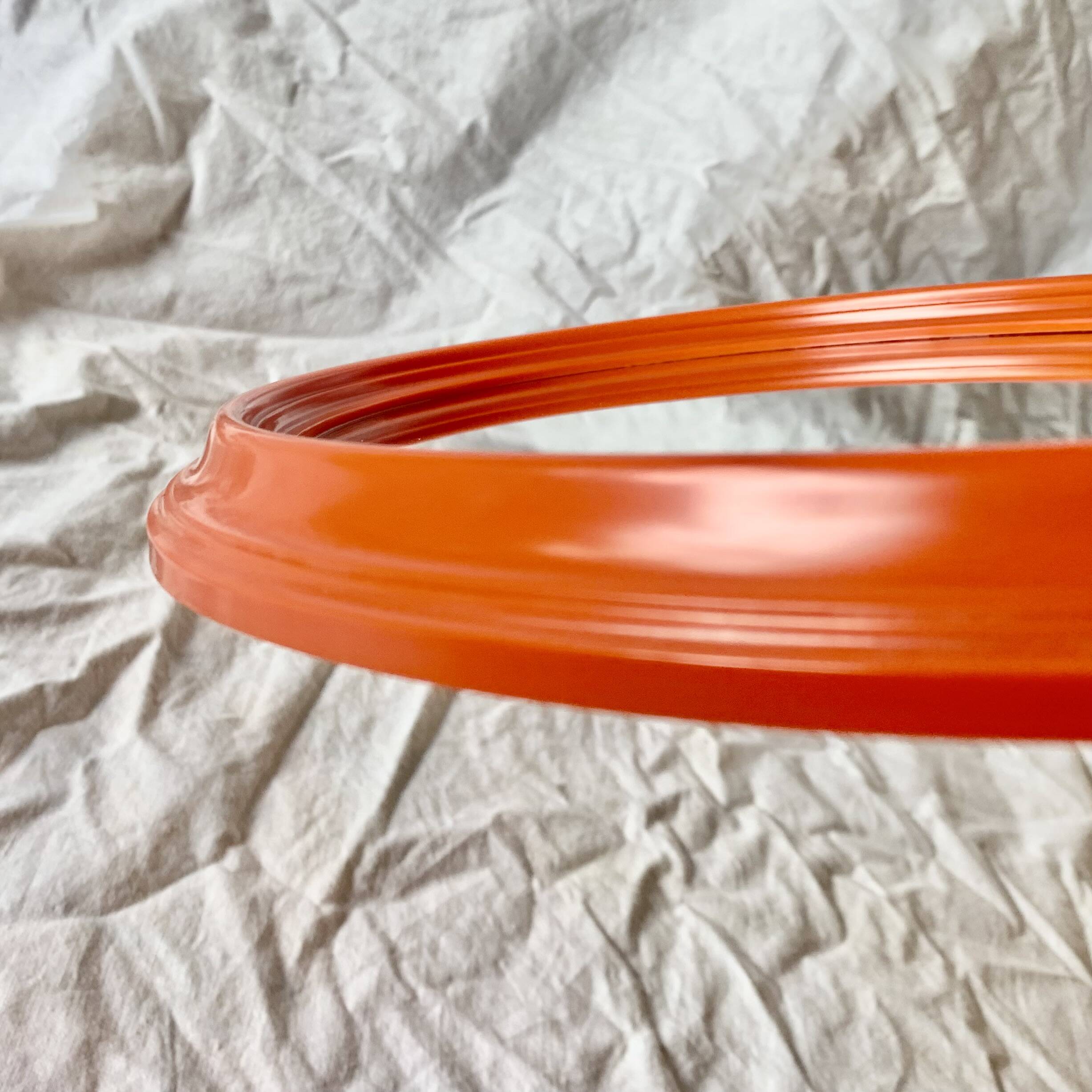Vintage orange plastic oval wall mirror