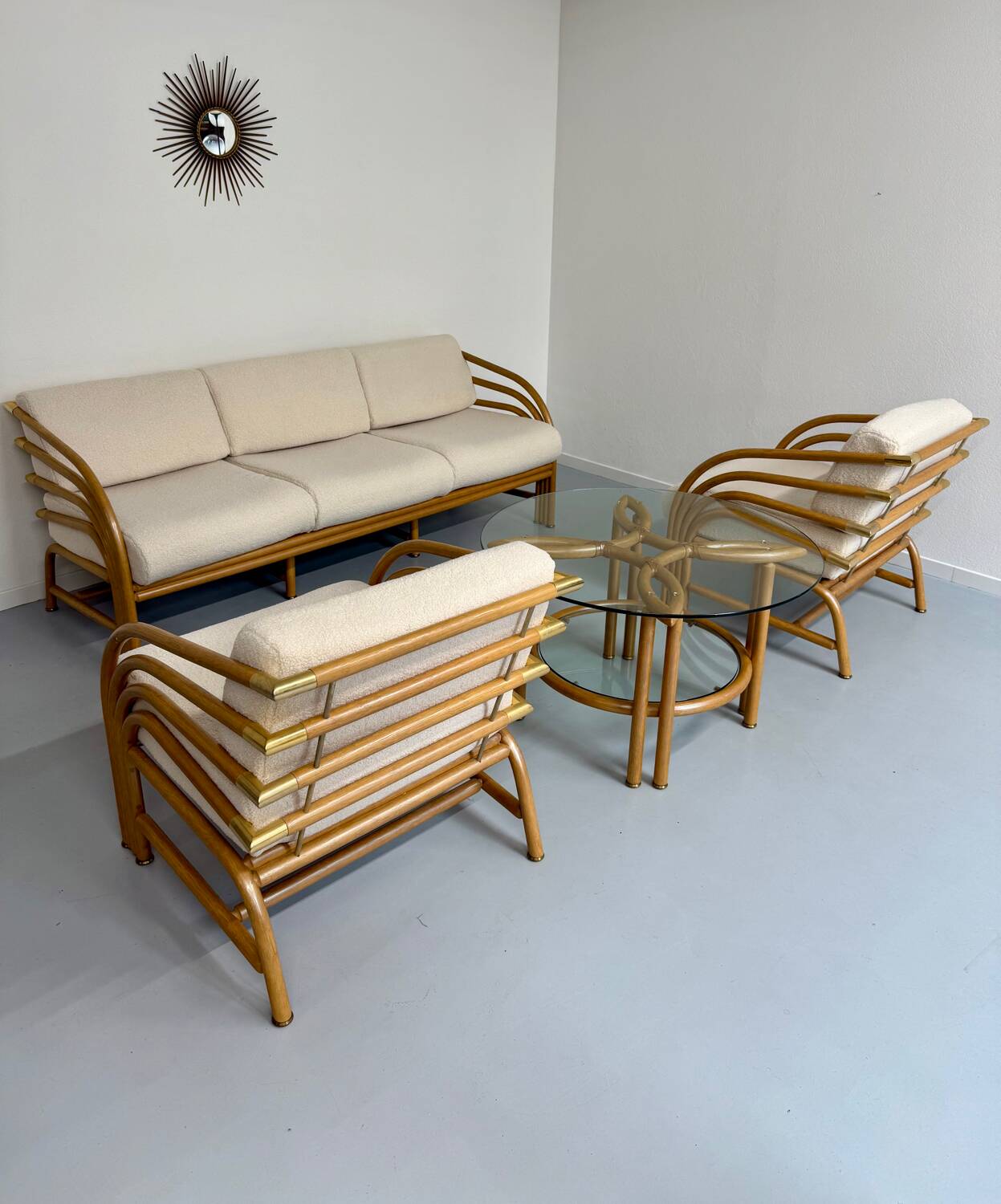 Complete living room with rattan sofa and white bouclette, brass finish, 80's design