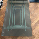 70s design coffee table in rectangular glass with chrome legs.