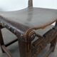 Set of 8 Gothic-style chairs in oak and studded leather.