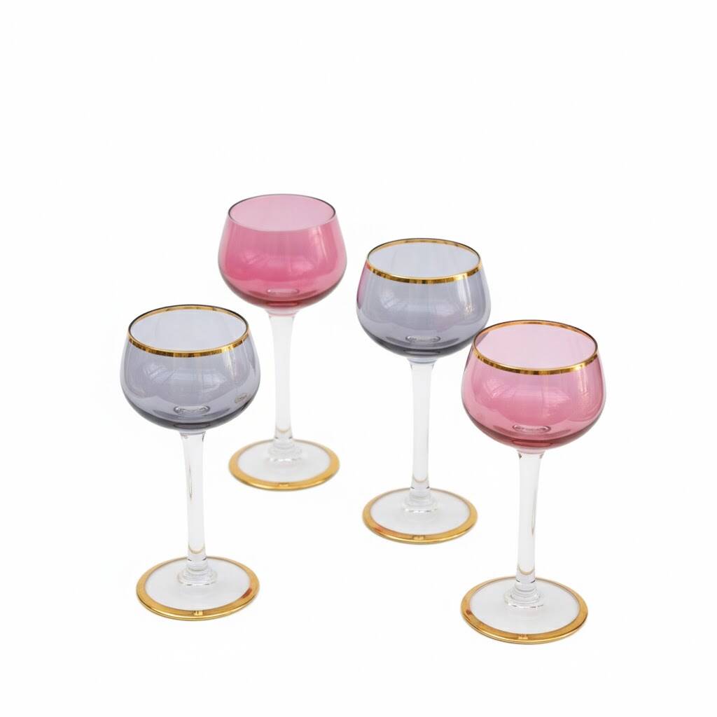 Four colorful stemmed wine glasses