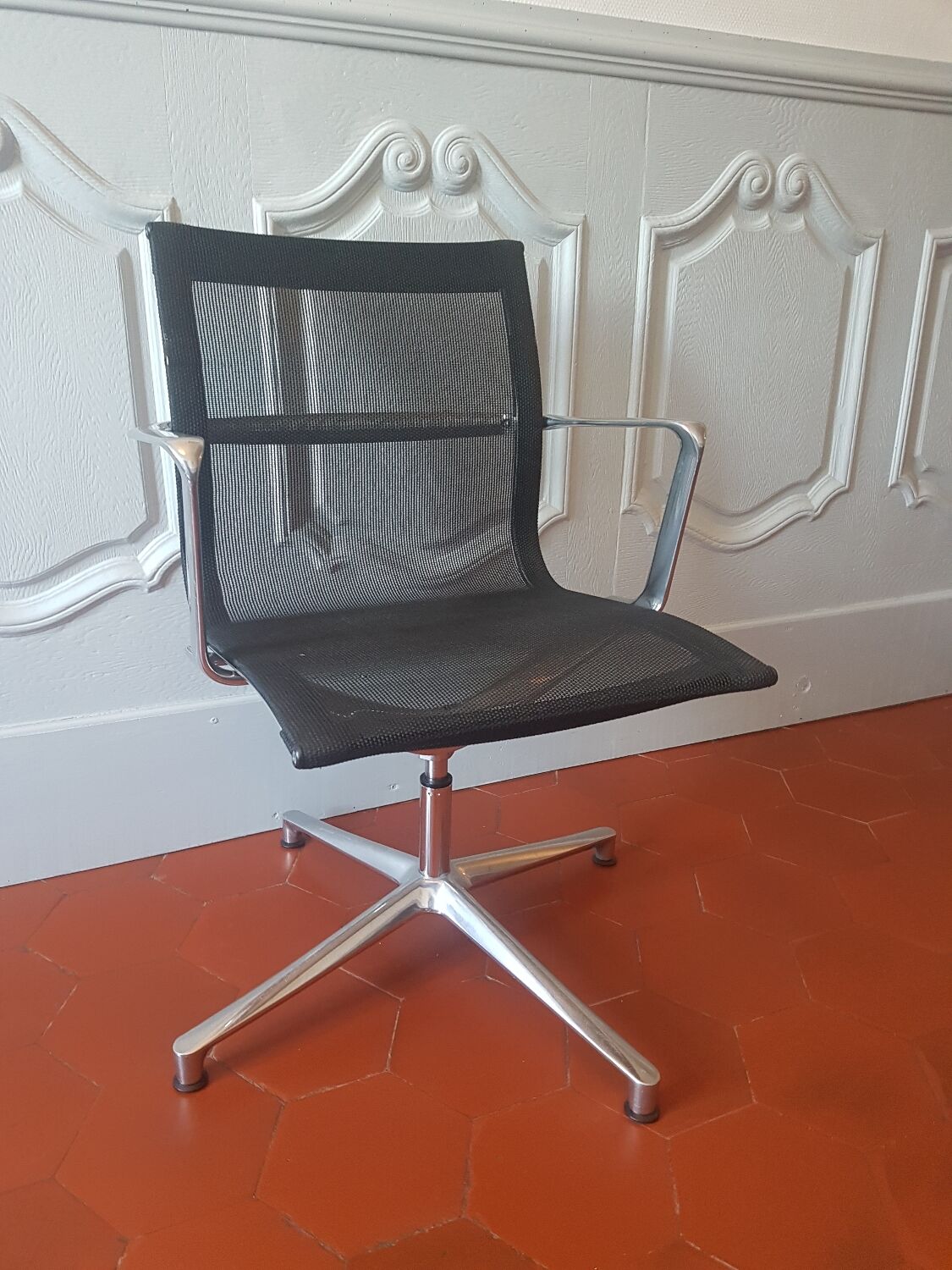 Una Chair armchair in black mesh published by ICF