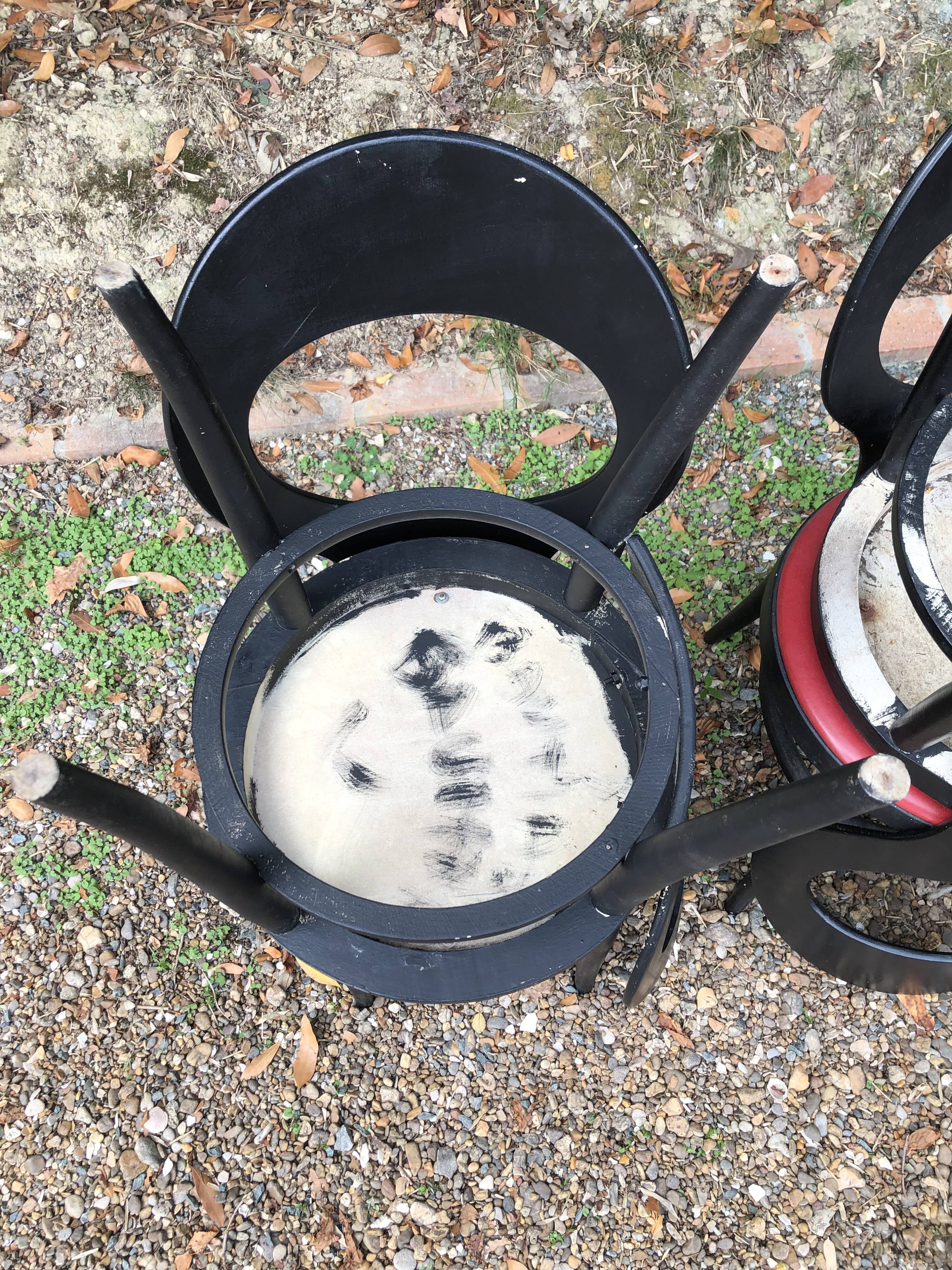 6 vintage Baumann seagull model chairs, black lacquered with red Skai seats.
