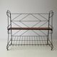 Free-standing shelf with a metal structure and 3 shelves, 1960s, Italy.
