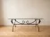 Classic coffee table in wrought iron and glass