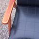 Pair of vintage beech armchairs feet compass covered with black moleskine from the 50s