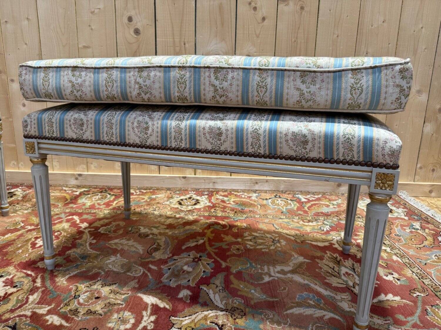 Pair of Louis XVI benches in lacquered and gilded wood