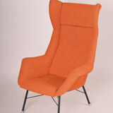 Orange Mid Century Modern armchair, made in 1960s Czechia